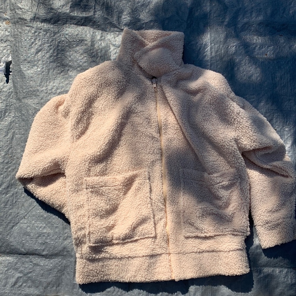 PINK cream color small jacket.